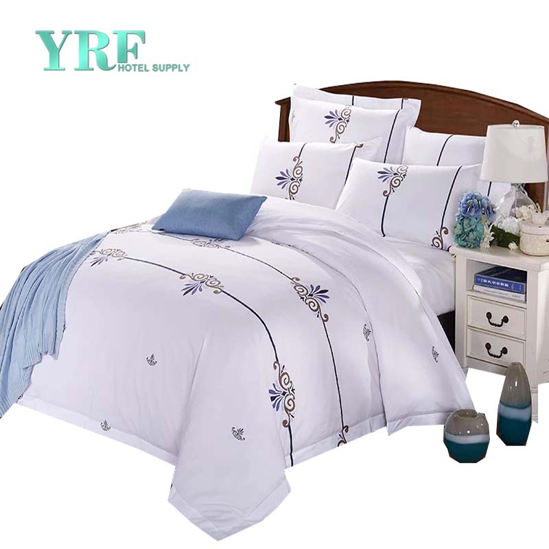 El edredón de lujo de la ropa de cama del hotel de cinco estrellas fija la cama individual blanca del algodón respirable